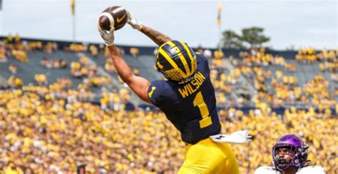 Michigan vs. Rutgers score prediction by college football .